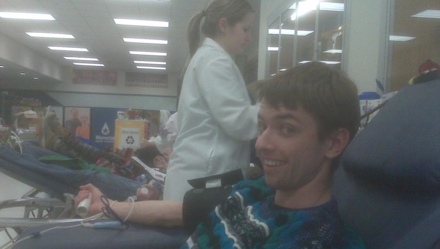 Brave senior Skelly Shaughnessy gives blood at the OHS drive.