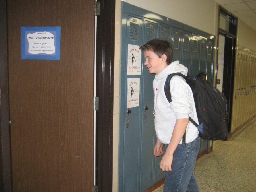 Eighth grade student Conor  Fitzpatrick going to his high school math class.