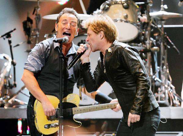 Bruce Springsteen and Jon Bon Jovi sing together at the 12/12/12 Sandy benefit concert. 
Dave Allocca / Starpix
