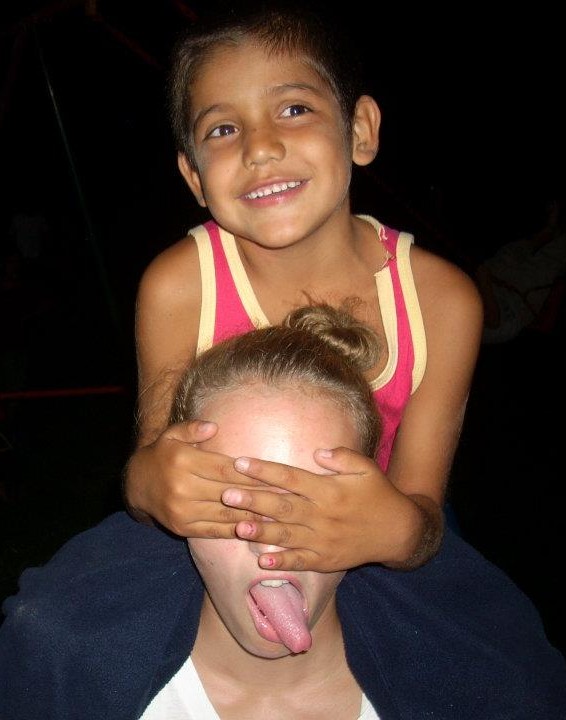 Lydia Wrobel and her sponsor child Miguel play by the soccor fields at Nuestros Pequenos Hermanos orphanage in Miacatlan, Mexico. Photo/ Maddie Mayhew