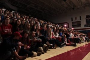 Photo/ Tessa Ostvig Students cheer on their peers performing at the Winterfest Variety Show.