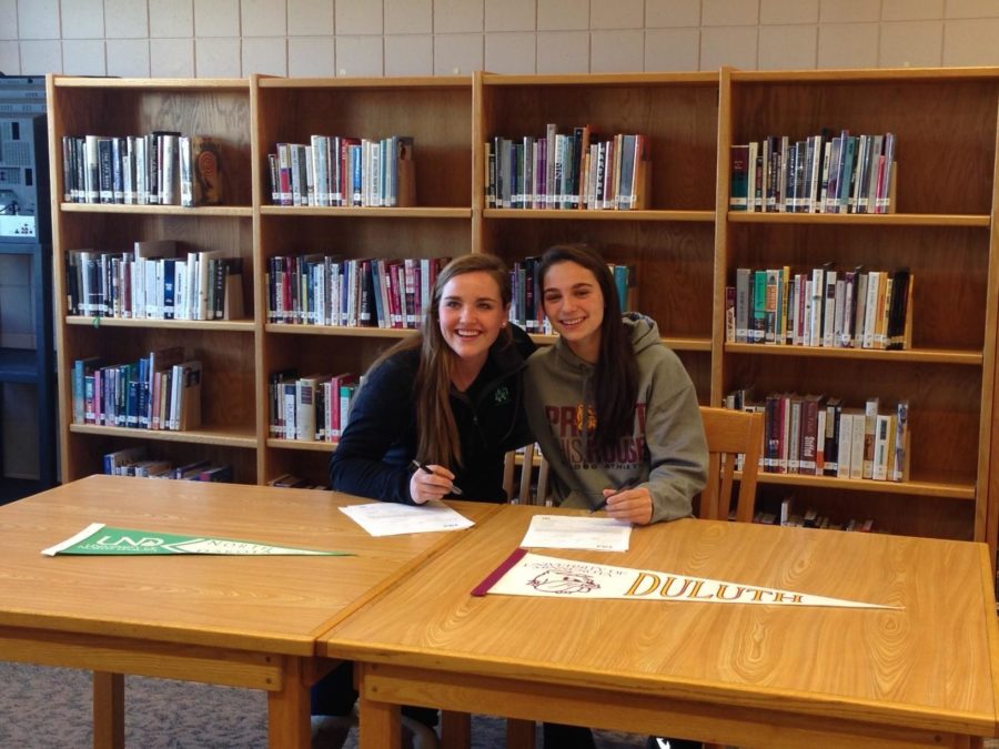Seniors Hannah Bergh (Left) and Becky Smith (Right) pose for a picture before they sign their National Letters of Intent 
