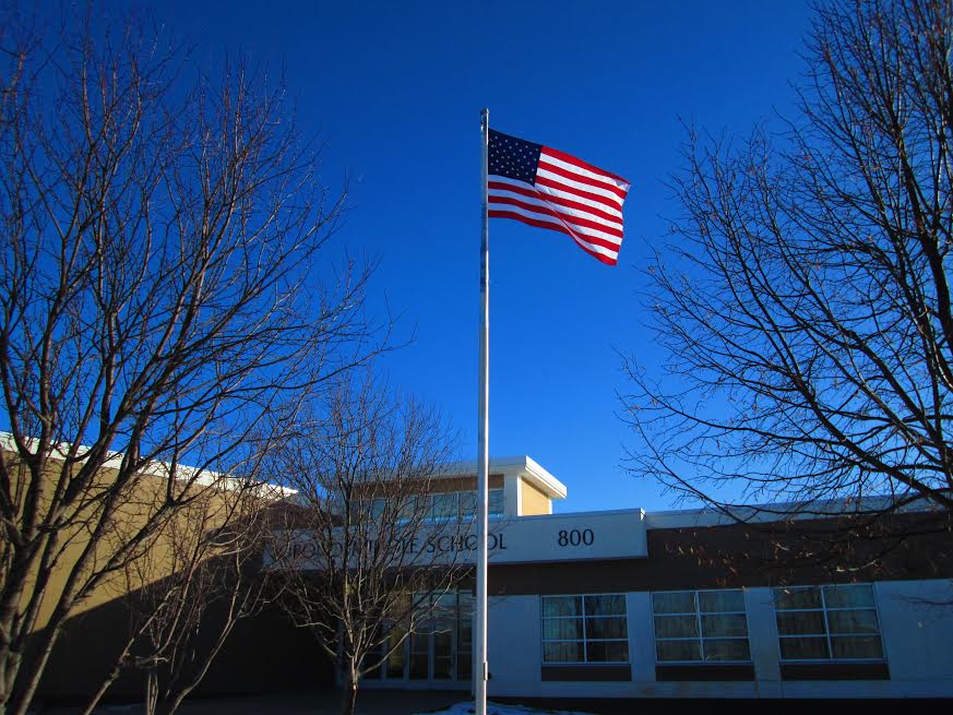 Old Glory still waves proudly in the breeze, undeterred by terroristic bullies