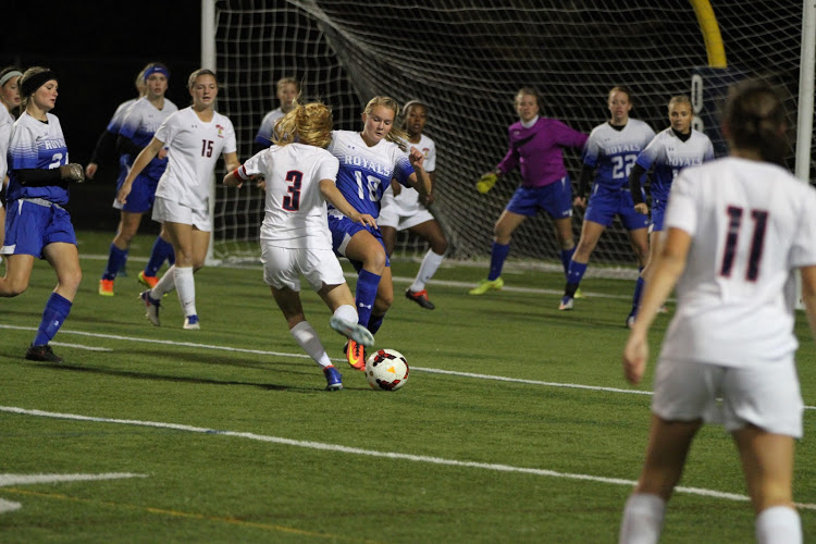 Senior Jenna Rakos approaches the net to attempt a goal. 