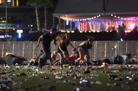 People run from the Route 91 Harvest country-music festival after apparent gunfire was heard on October 1, 2017, in Las Vegas, Nevada. 