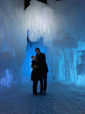 A young couple enjoys their time at the Ice Castles in Excelsior 