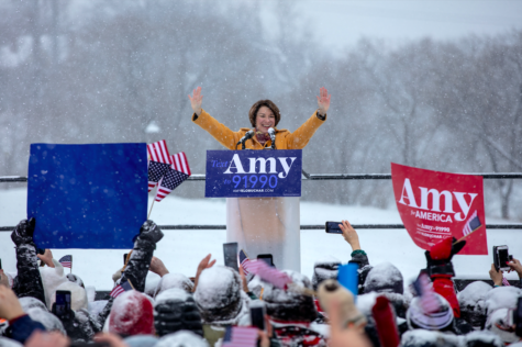 Klobuchar stands on the banks of the Mississippi announcing her campaign for the 2020 presidential election.