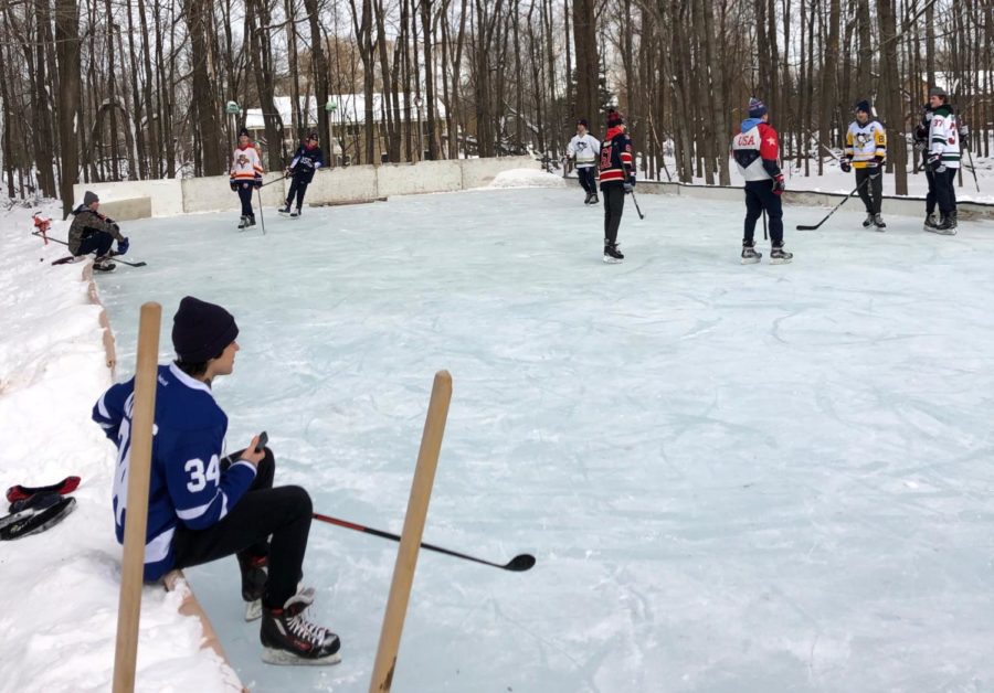 The Orono High school boys hockey teams enjoys a day of Pond hockey