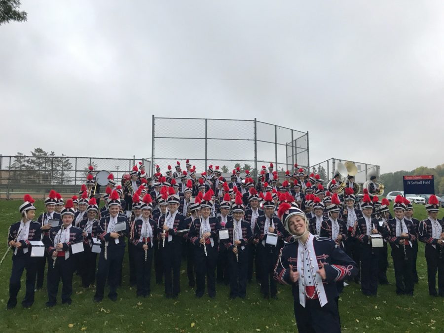 Orono bands are dressed in marching band uniforms.