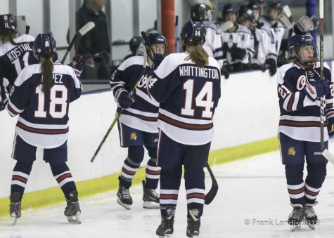 Whittington skates off the ice with her line for the next line to play.