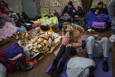 People taking shelter during the invasions happening in Ukraines Capital. People resting, using the subway as a bomb shelter