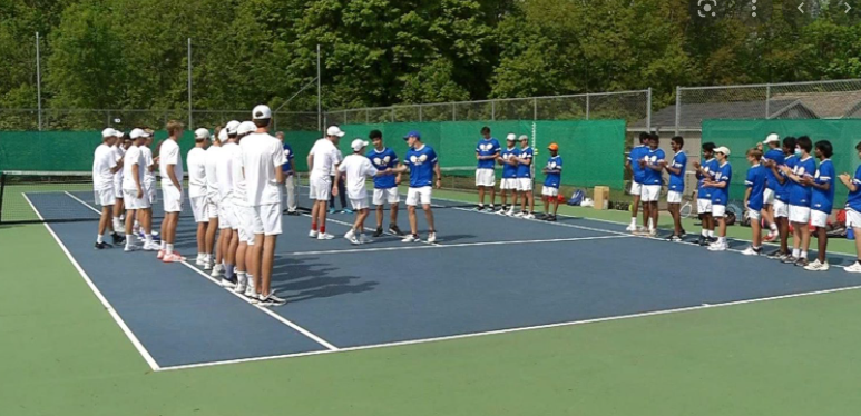 The Boys Tennis Team shakes hands with Wayzata after their section final win.