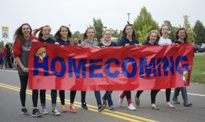 Orono students march in the Homecoming parade on Old Crystal Bay Rd.
