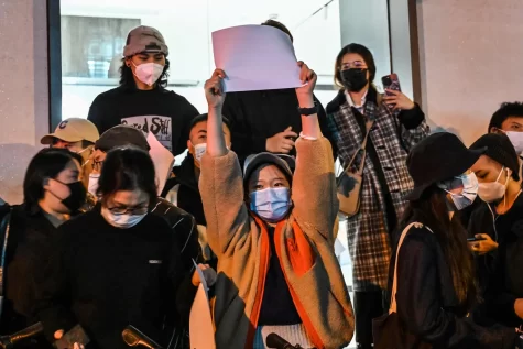 As protests spread across China in response to their governments zero-Covid policy, protesters hold blank sheets of paper over their faces; symbolizing Chinas extreme censorship.