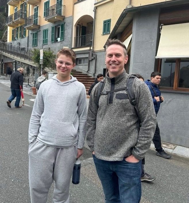 Mr. Aman (right) standing with freshman Toby Schwingler (left) during Spring Break in Monterosso, Italy 