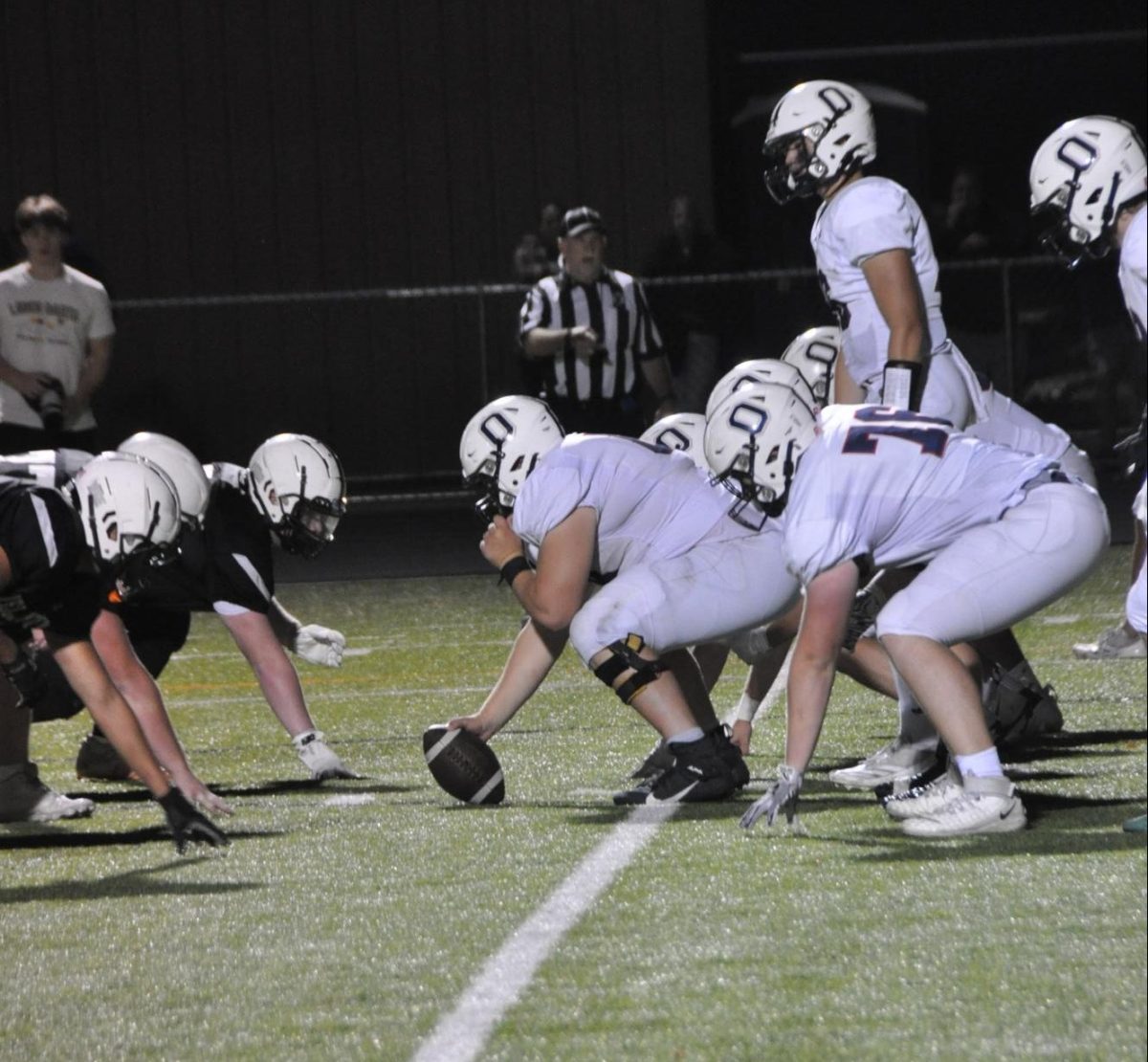 Captain Blake Van Patten lines up against Delano.