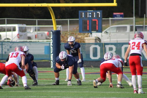 The Orono Spartans line up against Mound.