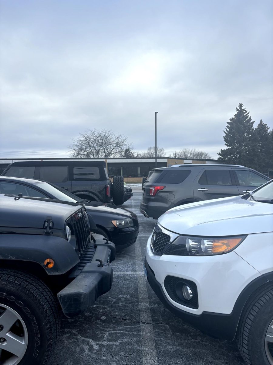 Students parked in the high school parking lot