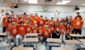 A photo of the Orono Unified Club wearing Be Kind shirts during Live Unified Week 2024.