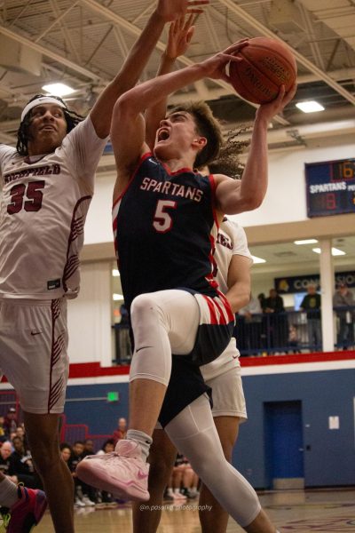 Nolan Groves goes for a dunk.