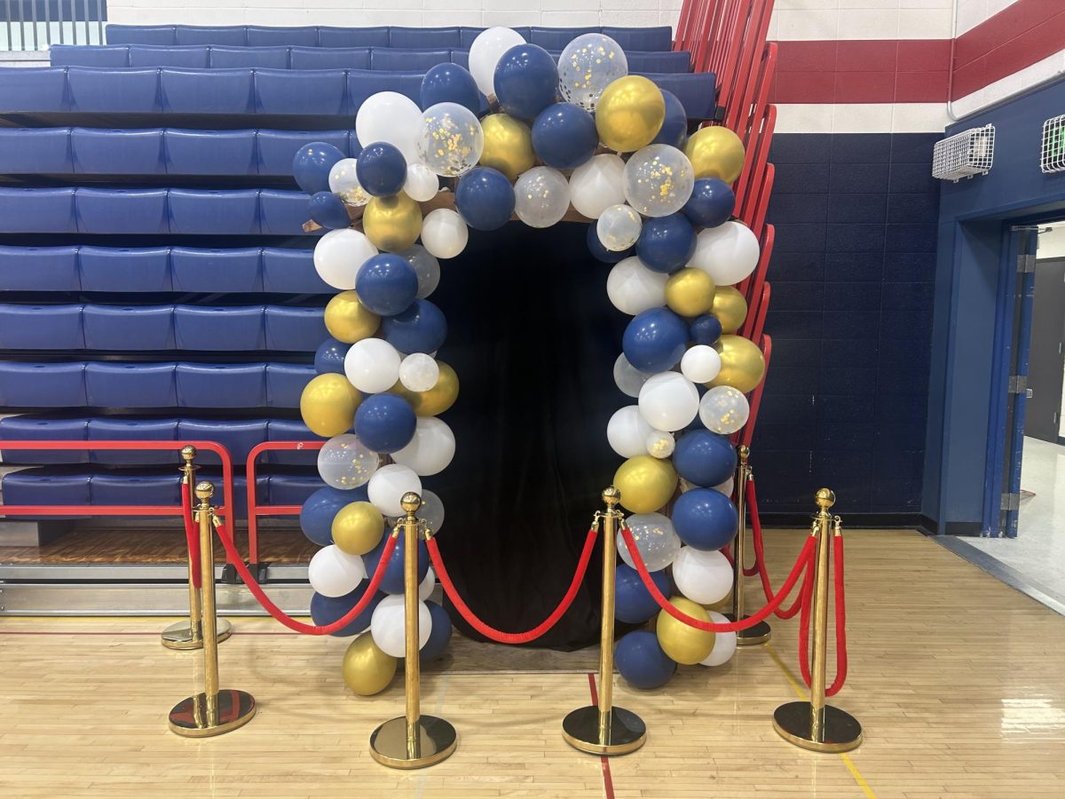 Students will enter the Grand March through the balloon arch made by student council