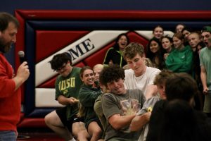 Junior team destroys sophomores in tug of war.