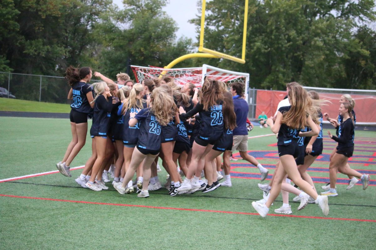Seniors celebrate after getting a touch down.