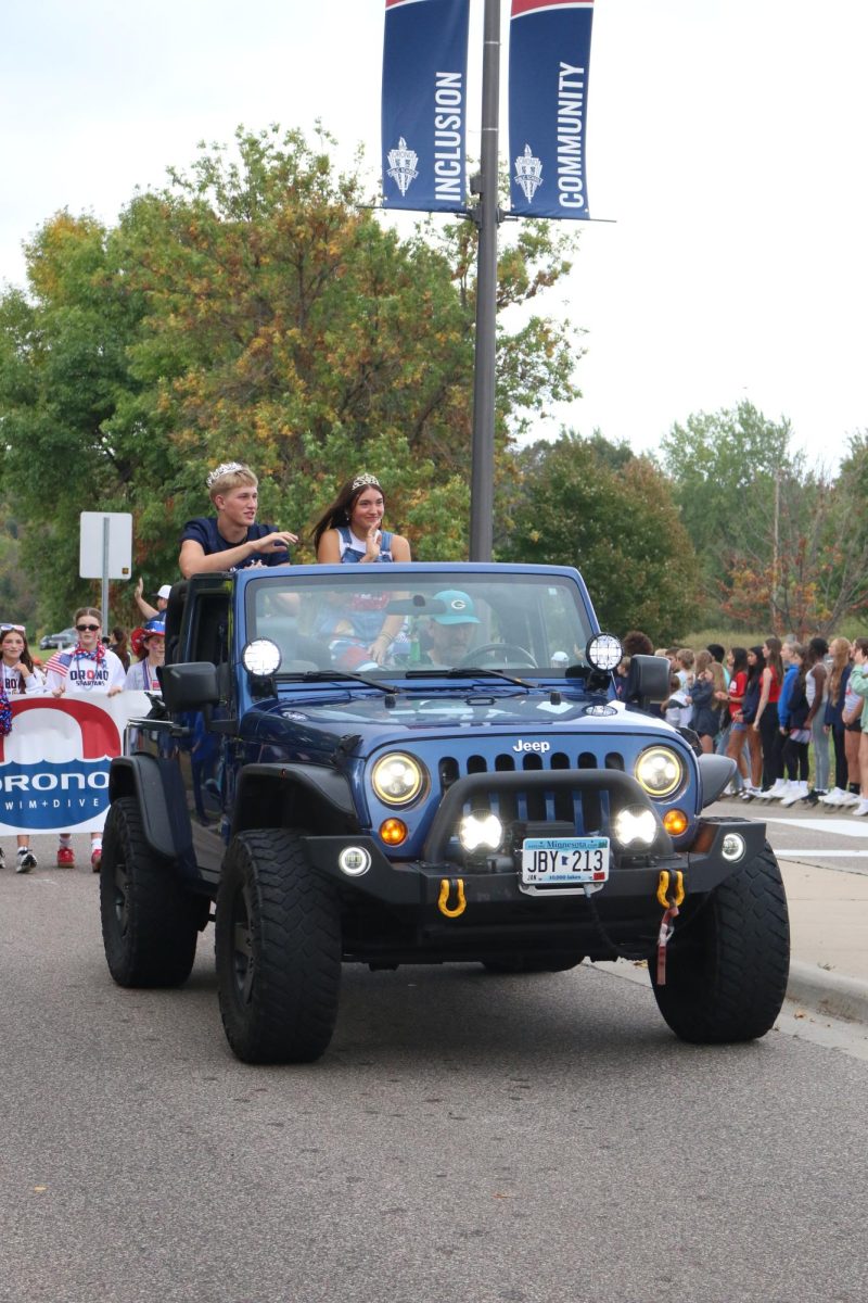 The Homecoming Queen, Ariah Ragan and Homecoming King, Dane Kanwischer ride in the parade.