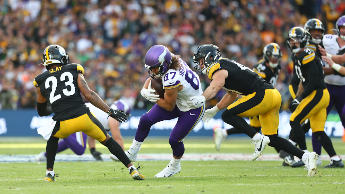Tight end #87 T.J. Hockenson being brought down by the Steelers' defense 