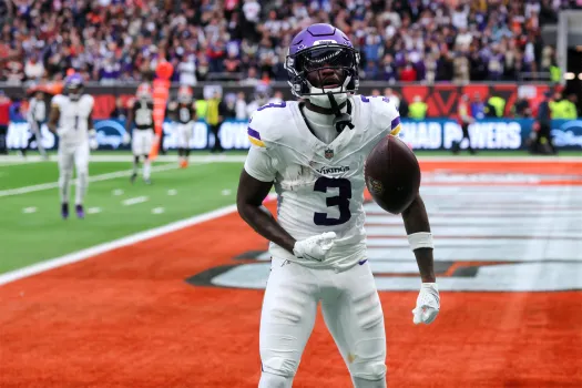 Minnesota Vikings wide receiver Jordan Addison (3) celebrates after scoring the winning touchdown in the second half of an NFL football game against the Cleveland Browns in London, Sunday, Oct. 5, 2025. 
