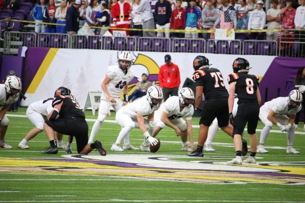 #13 Griffin Mauer makes sure his teammates are set.