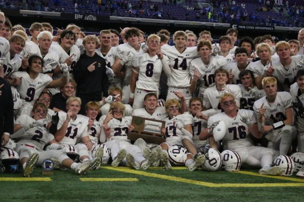 The Spartans captured their first-ever state championship win on Friday, defeating Kasson-Mantorville in a thrilling 21-14 victory.